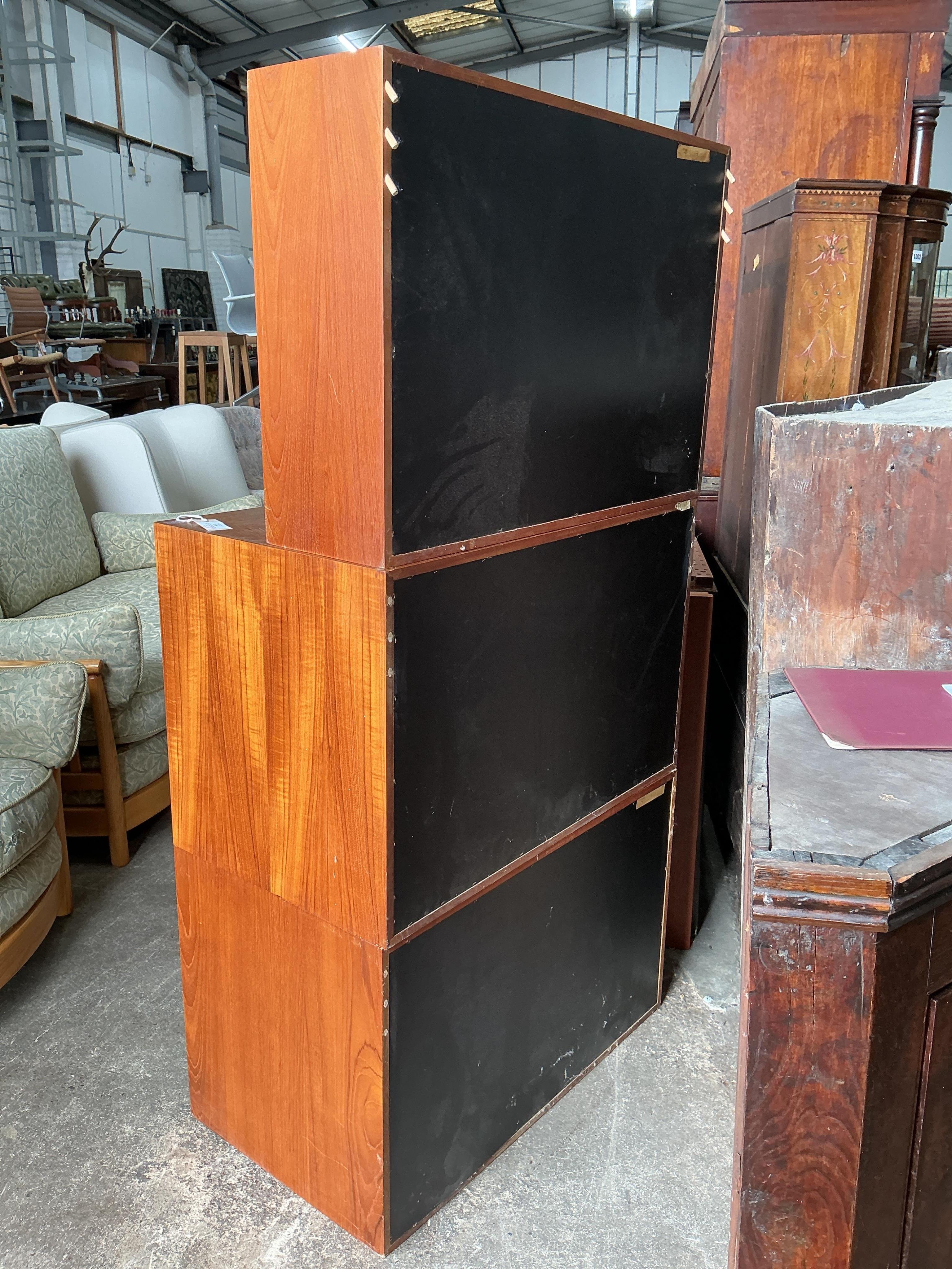 A Poul Cadovius Royal System teak three section wall system, width 80cm, depth 46cm, height 159cm